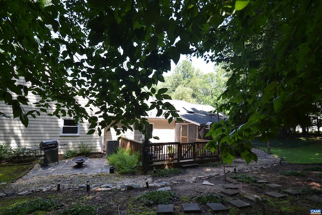 2090 Tavernor Ln, Charlottesville, VA 22911 - view of yard with a wooden deck, a patio area, and an outdoor fire pit