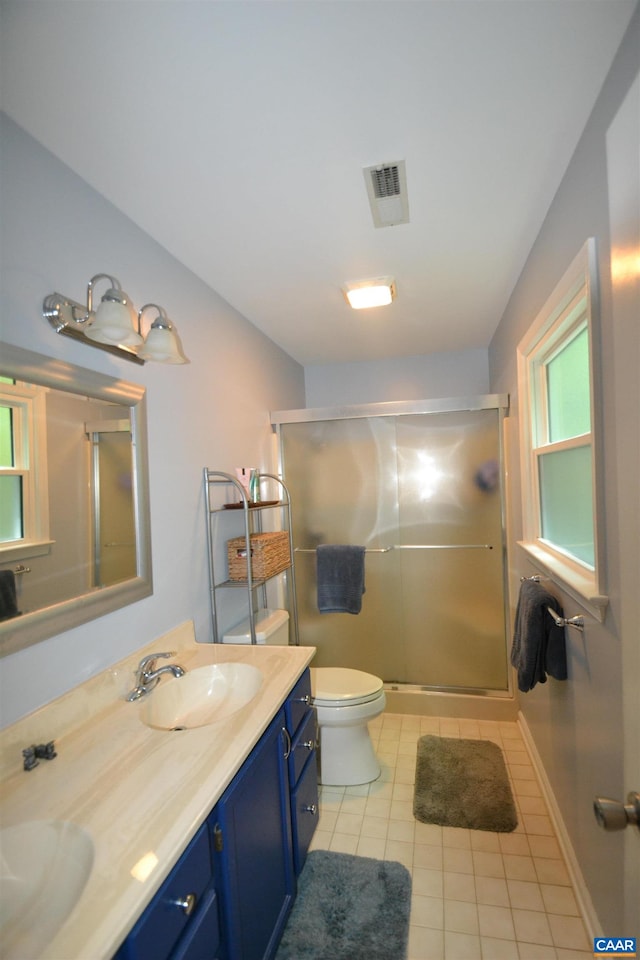 2090 Tavernor Ln, Charlottesville, VA 22911 - full bathroom featuring tile patterned floors, double vanity, and a shower stall