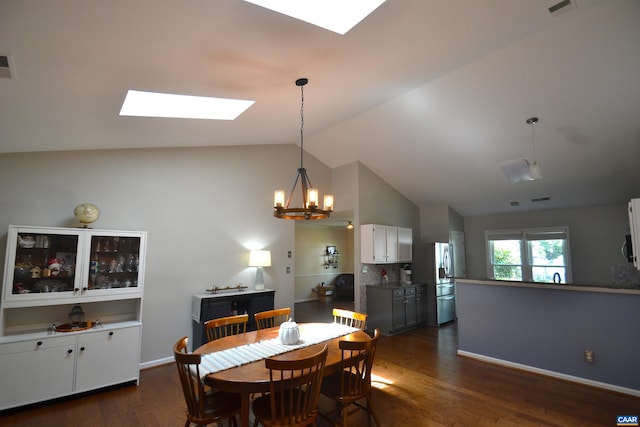 2090 Tavernor Ln, Charlottesville, VA 22911 - dining space featuring a skylight, dark wood-type flooring, a chandelier, and high vaulted ceiling