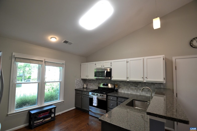 2090 Tavernor Ln, Charlottesville, VA 22911 - kitchen featuring stainless steel appliances, tasteful backsplash, dark wood-style floors, white cabinetry, and lofted ceiling