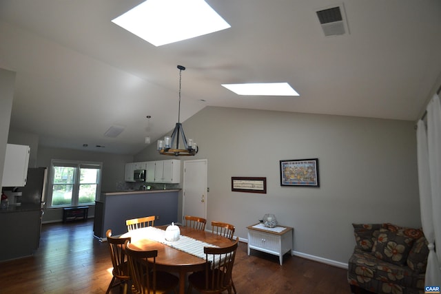 2090 Tavernor Ln, Charlottesville, VA 22911 - dining room featuring a skylight, lofted ceiling, and dark wood-type flooring