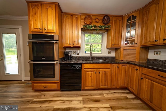  - kitchen with dishwasher, stainless steel double oven, crown molding, brown cabinetry, and tasteful backsplash