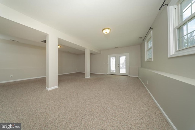  - basement featuring carpet and french doors
