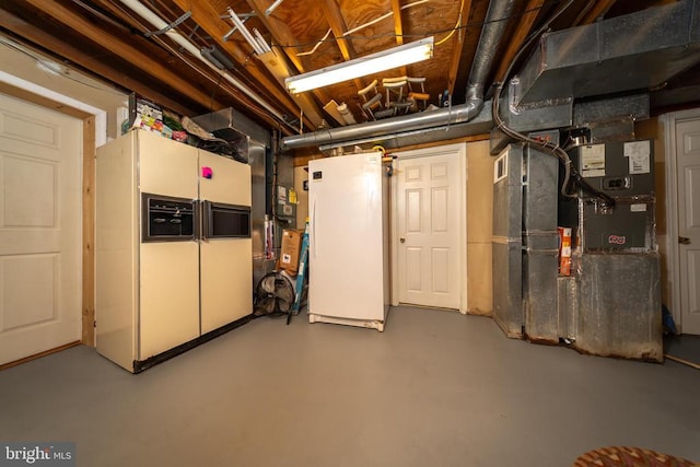  - unfinished basement with freestanding refrigerator