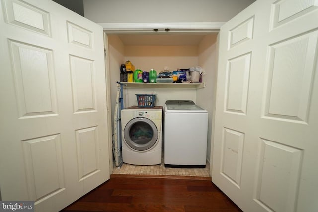  - washroom featuring independent washer and dryer and dark wood finished floors
