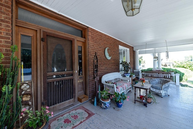 289 Newman Ave, Harrisonburg, VA 22801 - view of exterior entry featuring covered porch and brick siding