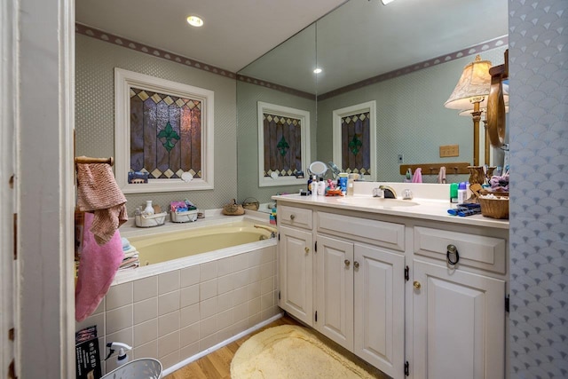 289 Newman Ave, Harrisonburg, VA 22801 - bathroom featuring vanity, wood finished floors, a bath, and recessed lighting