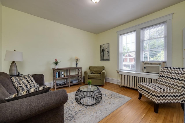 289 Newman Ave, Harrisonburg, VA 22801 - sitting room featuring radiator heating unit, hardwood / wood-style flooring, baseboards, and cooling unit
