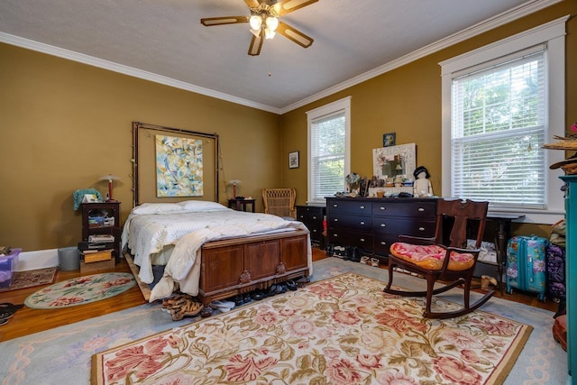 289 Newman Ave, Harrisonburg, VA 22801 - bedroom with crown molding, wood finished floors, and a ceiling fan