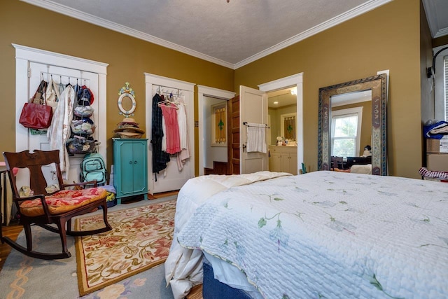 289 Newman Ave, Harrisonburg, VA 22801 - bedroom featuring ornamental molding, wood finished floors, and ensuite bathroom