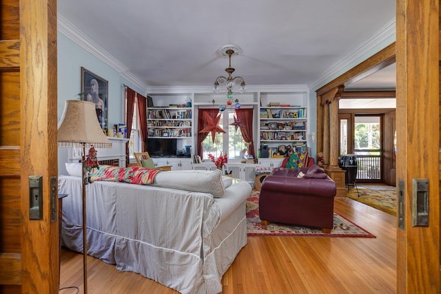 289 Newman Ave, Harrisonburg, VA 22801 - living room featuring ornamental molding, wood finished floors, and a chandelier
