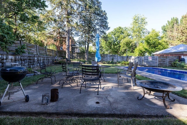 289 Newman Ave, Harrisonburg, VA 22801 - fenced backyard featuring a patio and a grill