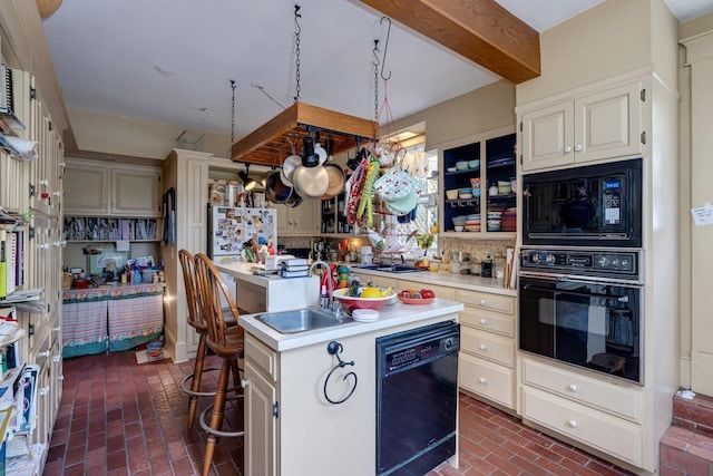 289 Newman Ave, Harrisonburg, VA 22801 - kitchen featuring black appliances, brick floors, light countertops, and a sink