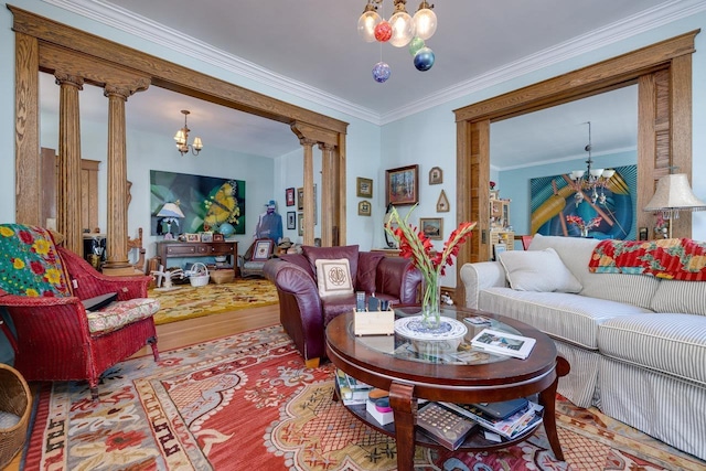 289 Newman Ave, Harrisonburg, VA 22801 - living room featuring a chandelier, wood finished floors, ornamental molding, and decorative columns