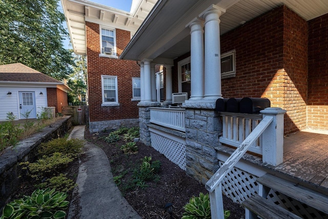 289 Newman Ave, Harrisonburg, VA 22801 - view of home's exterior with a porch, brick siding, and cooling unit