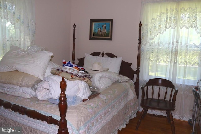  - bedroom with wood finished floors
