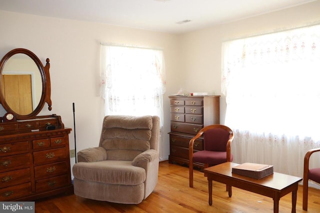  - sitting room with wood finished floors
