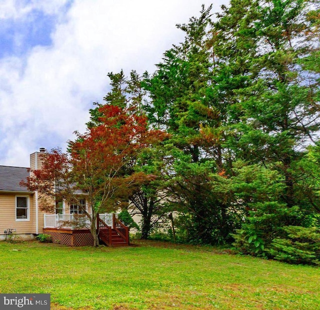 10807 Bent Tree Dr, Fredericksburg, VA 22407 - view of grassy yard with a wooden deck