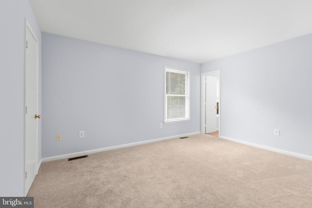 10807 Bent Tree Dr, Fredericksburg, VA 22407 - empty room featuring light colored carpet and baseboards
