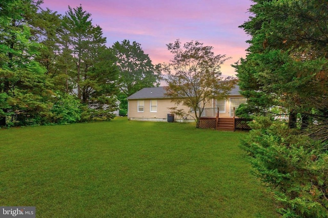 10807 Bent Tree Dr, Fredericksburg, VA 22407 - yard at dusk with a yard and a wooden deck