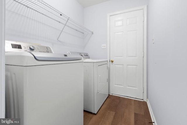 10807 Bent Tree Dr, Fredericksburg, VA 22407 - laundry area with washer and clothes dryer and dark wood-style flooring