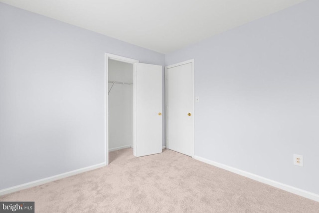 10807 Bent Tree Dr, Fredericksburg, VA 22407 - unfurnished bedroom featuring carpet floors, baseboards, and a closet