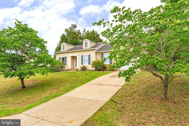 10807 Bent Tree Dr, Fredericksburg, VA 22407 - new england style home with driveway and a front yard