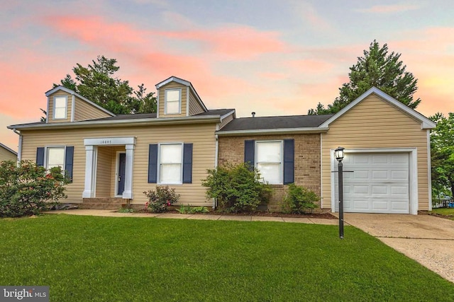 10807 Bent Tree Dr, Fredericksburg, VA 22407 - view of front facade featuring a garage, driveway, and a yard