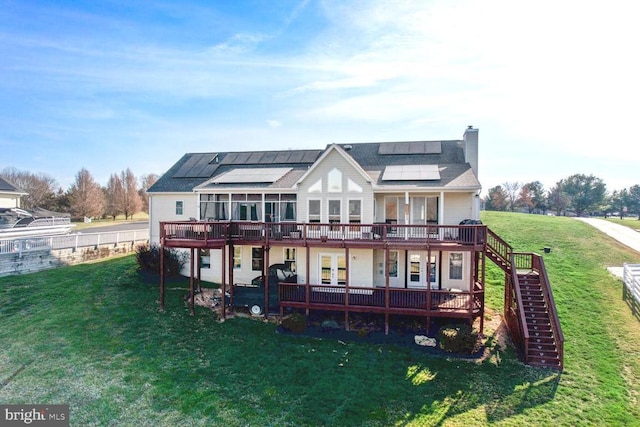 6800 Lake Pointe Dr, Mineral, VA 23117 - rear view of property with stairway, a wooden deck, a chimney, and a lawn
