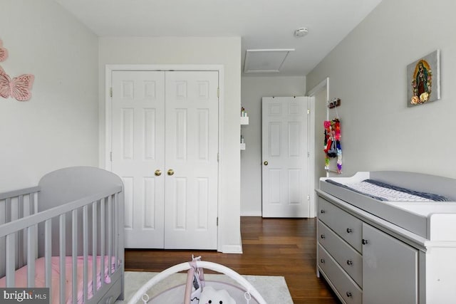 7688 Wankoma Dr, Remington, VA 22734 - bedroom with a closet, dark wood finished floors, attic access, and a nursery area