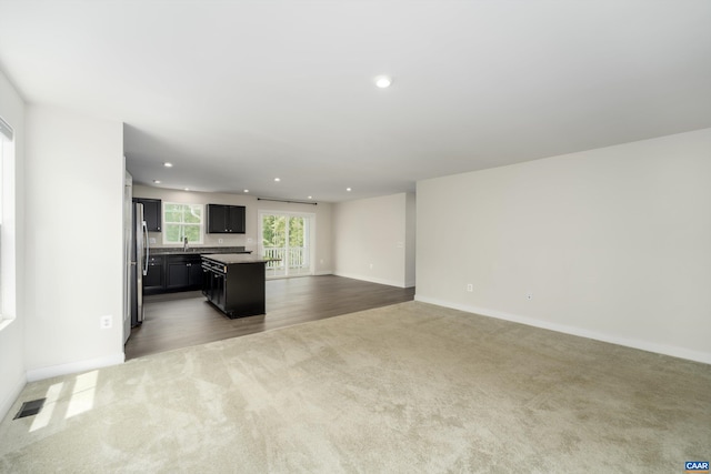 107 Archer Dr, Palmyra, VA 22963 - unfurnished living room featuring carpet floors and recessed lighting