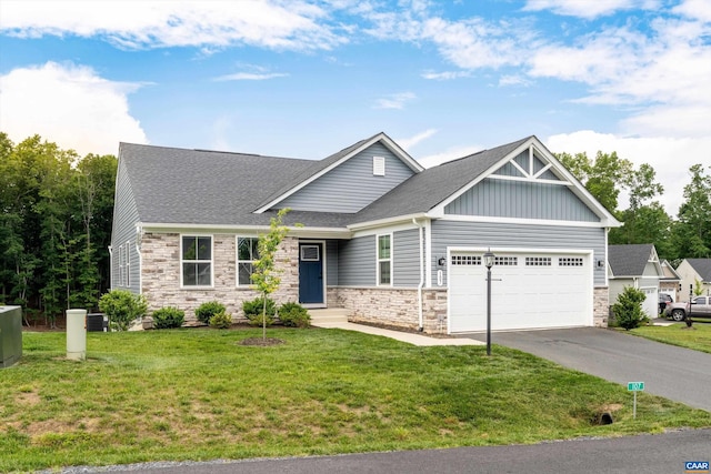 107 Archer Dr, Palmyra, VA 22963 - craftsman inspired home featuring a garage, asphalt driveway, stone siding, and board and batten siding