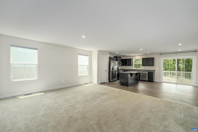 107 Archer Dr, Palmyra, VA 22963 - unfurnished living room with carpet and recessed lighting