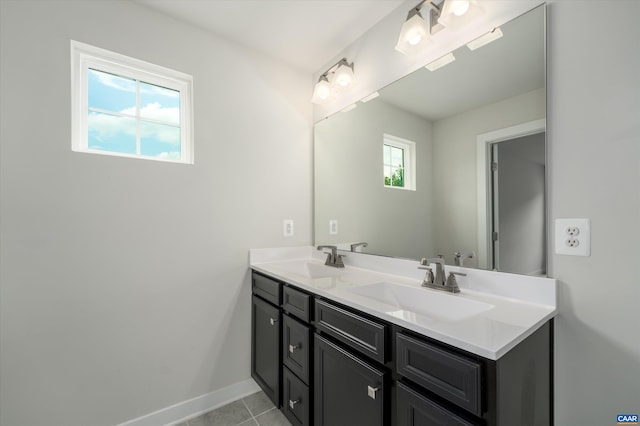 107 Archer Dr, Palmyra, VA 22963 - full bathroom with double vanity and tile patterned floors