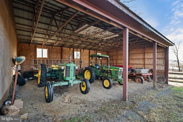 - garage featuring a carport