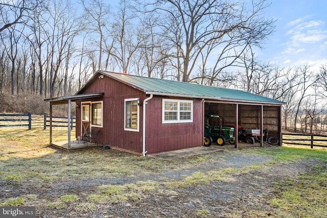  - view of outdoor structure featuring a carport