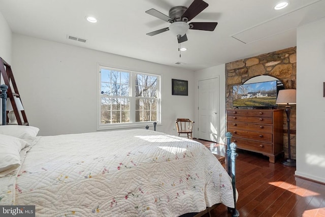  - bedroom featuring hardwood / wood-style floors, attic access, recessed lighting, and a ceiling fan