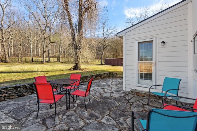  - view of patio / terrace featuring outdoor dining space