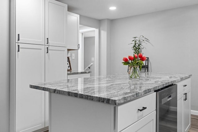 14372 E Side Hwy S, Grottoes, VA 24401 - kitchen with white cabinets, light stone countertops, wood finished floors, and recessed lighting