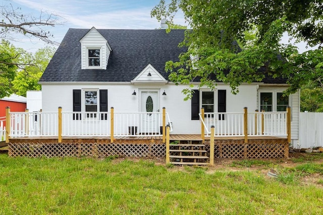 14372 E Side Hwy S, Grottoes, VA 24401 - cape cod-style house with a wooden deck, roof with shingles, and a front yard