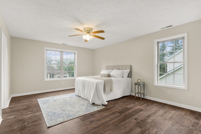 740 Confederacy Dr, Penn Laird, VA 22846 - bedroom featuring multiple windows, dark wood-type flooring, baseboards, and ceiling fan