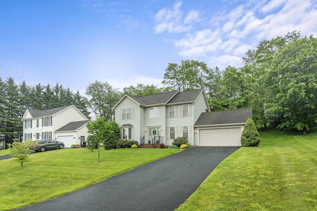740 Confederacy Dr, Penn Laird, VA 22846 - colonial inspired home with asphalt driveway, a front lawn, and an attached garage