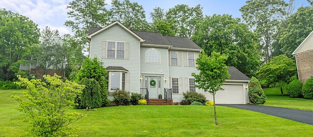 740 Confederacy Dr, Penn Laird, VA 22846 - view of front of home featuring asphalt driveway, a front yard, and a garage