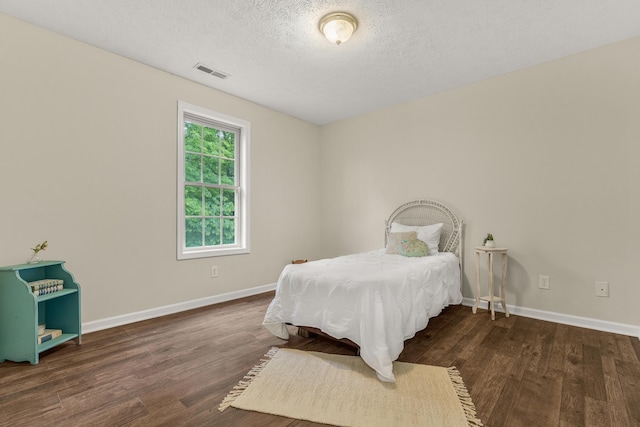 740 Confederacy Dr, Penn Laird, VA 22846 - bedroom with wood finished floors, a textured ceiling, and baseboards