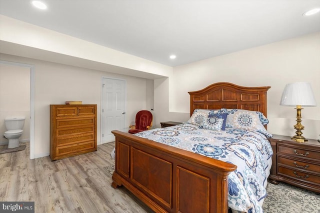 12006 Falcon Ridge Dr, Fredericksburg, VA 22407 - bedroom with light wood-type flooring, recessed lighting, and connected bathroom