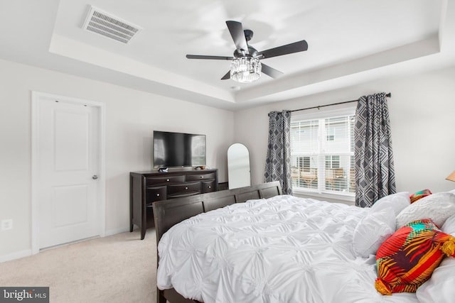 3801 Drayton Ct, Fredericksburg, VA 22408 - bedroom with a tray ceiling, carpet flooring, and ceiling fan