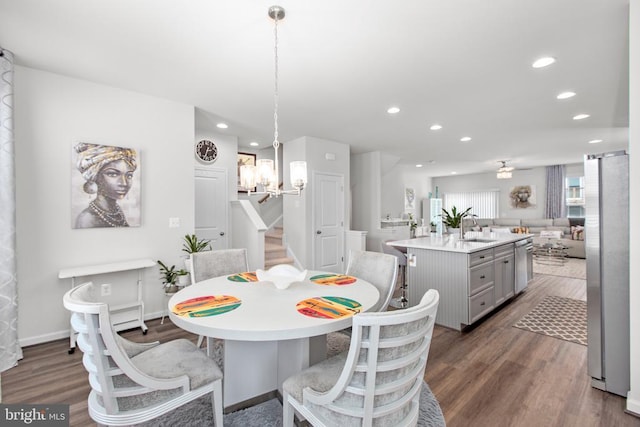 3801 Drayton Ct, Fredericksburg, VA 22408 - dining area featuring wood finished floors, recessed lighting, stairs, and a chandelier