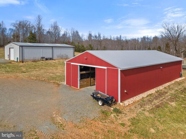 9107 Grasty Gold Mine Rd, Rhoadesville, VA 22542 - view of pole building featuring a lawn