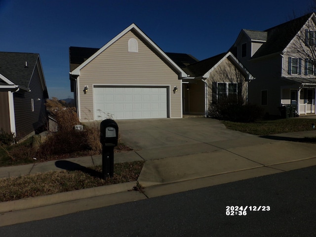 view of front of home with a garage