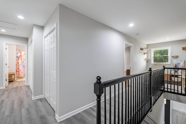 16715 Prospect Ave E, Elkton, VA 22827 - hallway featuring an upstairs landing, wood finished floors, recessed lighting, baseboards, and attic access